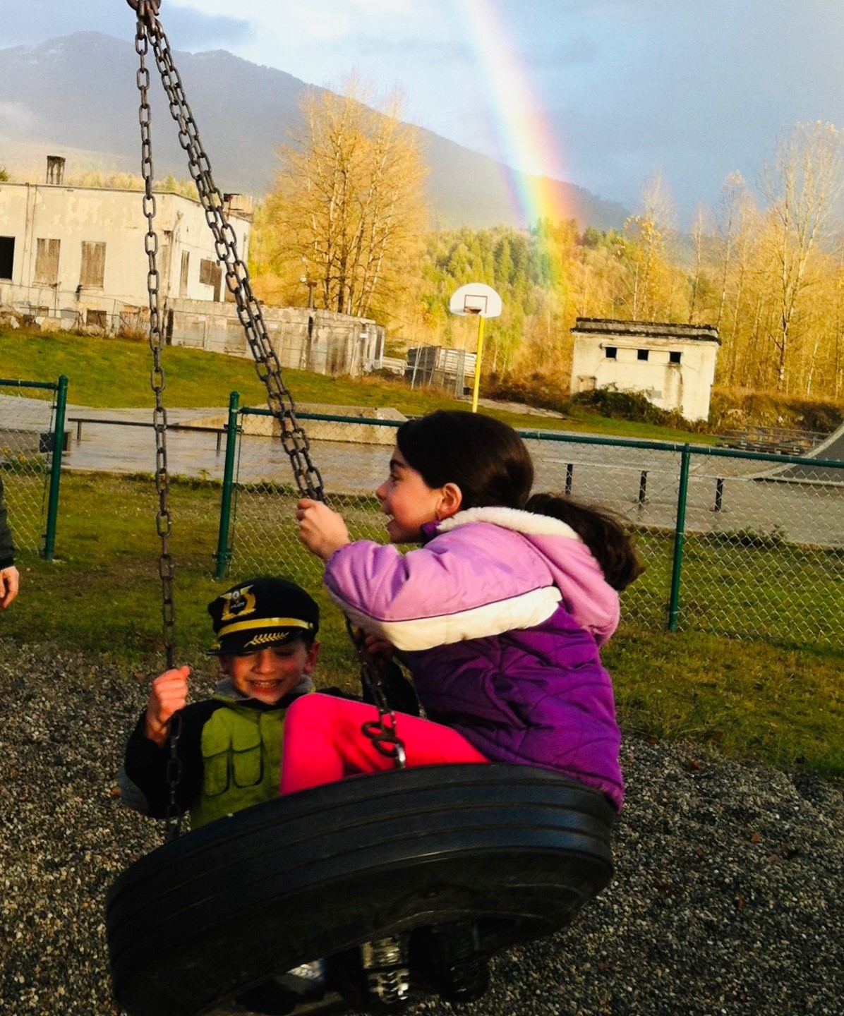 Vic and Celestine with a rainbow